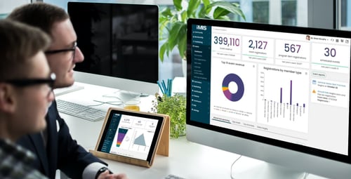 2 People looking at iMIS Dashboards