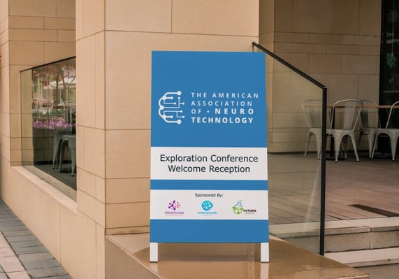 Mockup of a conference welcome sign with sponsor logos.