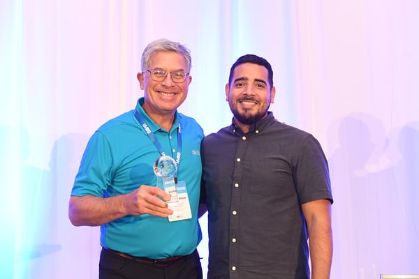 Juan Pereyra of America's Health Insurance Plans (AHIP) accepts a Great Things Award